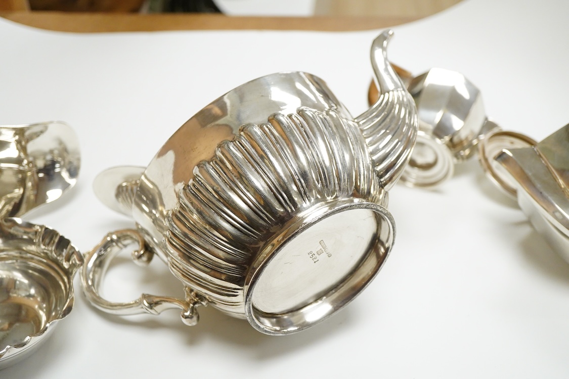 A 20th century continental 800 standard white metal hot water pot and cream jug (lacking cover and knop), gross weight 11.2oz, together with a plated teapot, sauceboat and bowl.
